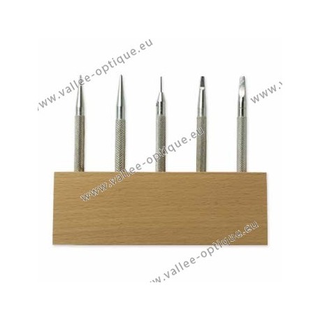 Set of punching tools on wood stand