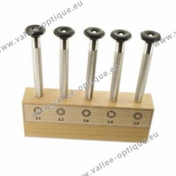 Set of nut wrenches on wooden stand